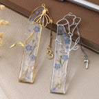 Resin-Lesezeichen mit getrockneten Geburtsmonatsblumen und Zahlenanhänger