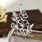Lesezeichen mit Geburtsblume und Initialen, Metallrahmen mit konservierter Blume